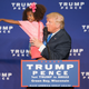 Republican presidential nominee Donald Trump holds a child as he speaks during a rally at the KI Convention Center in Green Bay, Wis., on Oct. 17, 2016.
TASOS KATOPODIS/AFP/Getty Images